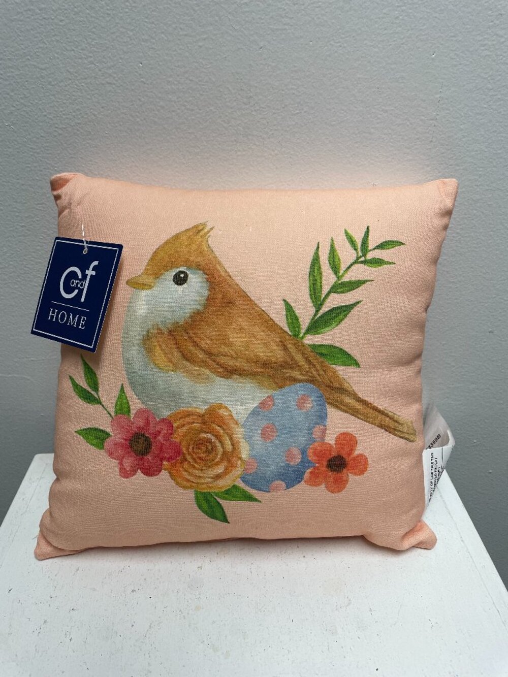 10"x10" decorative throw pillow features a lovely bird design